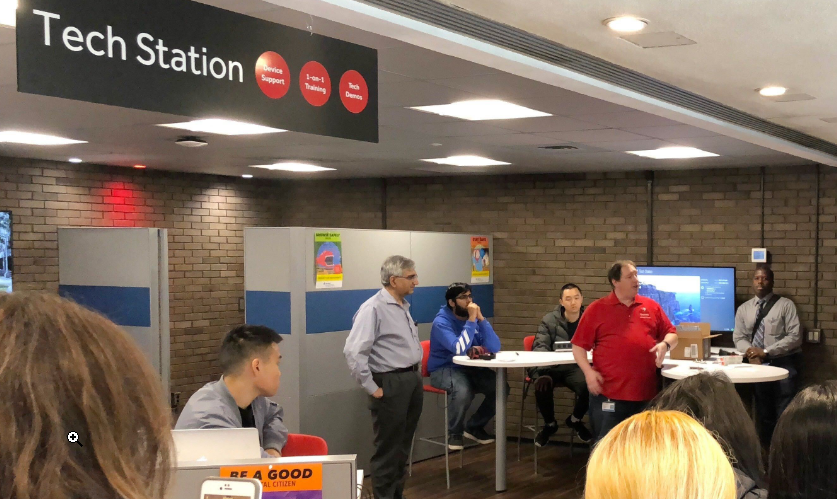 Professionals talking with students
